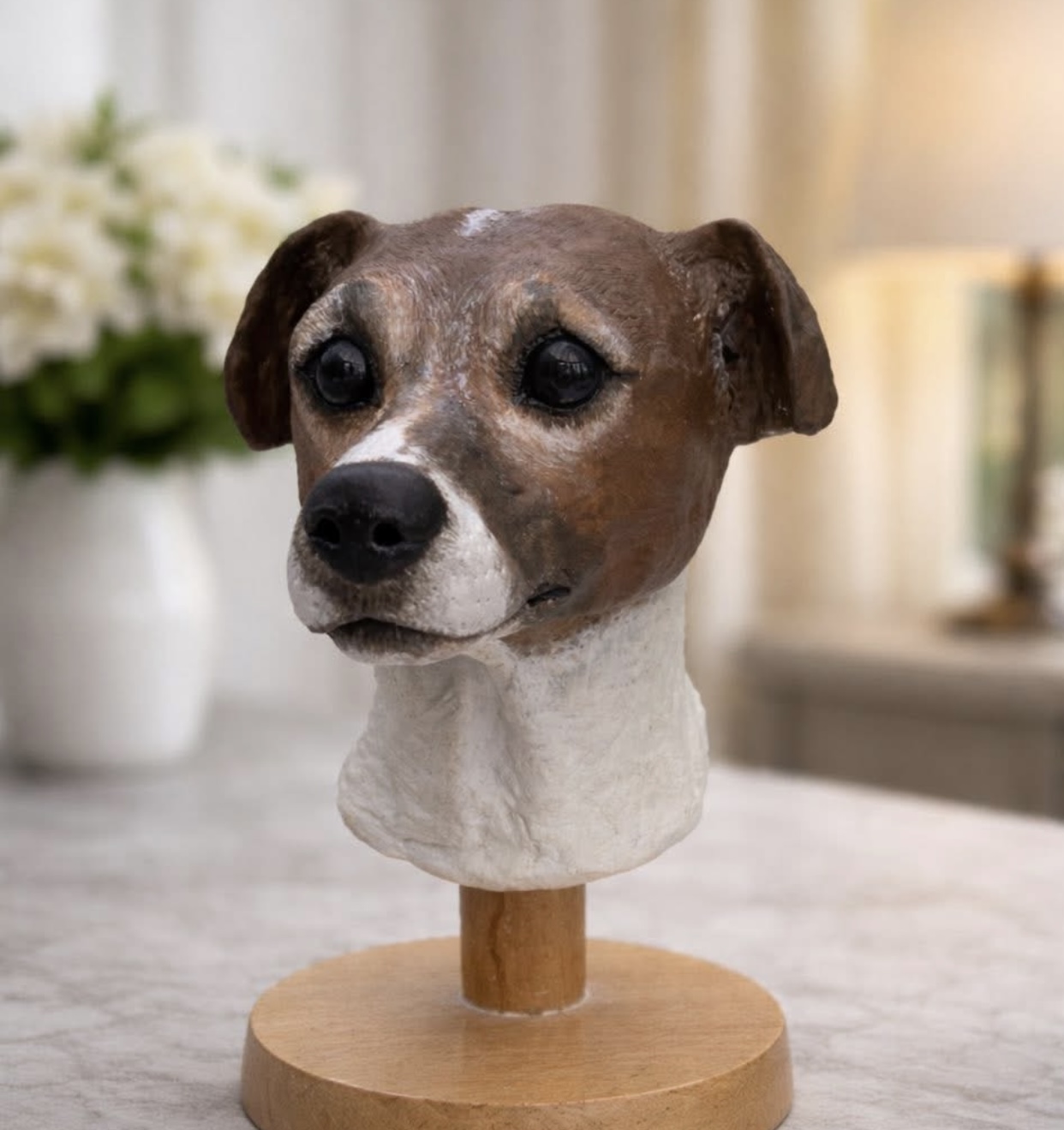 Hand-sculpted clay portrait of Coco the Jack Russell
